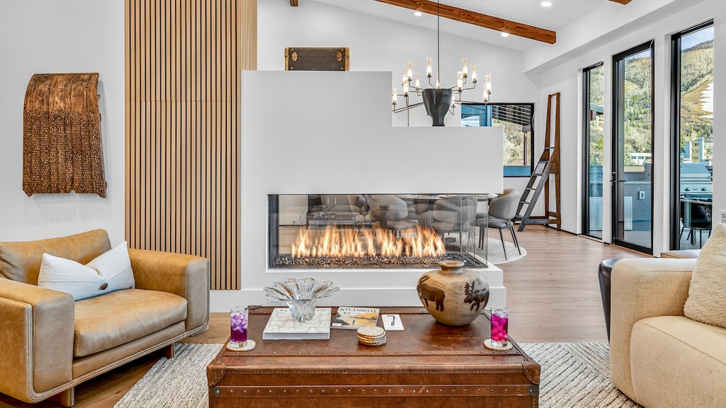 Great Room Upper Level - Three-sided, glass-walled fireplace