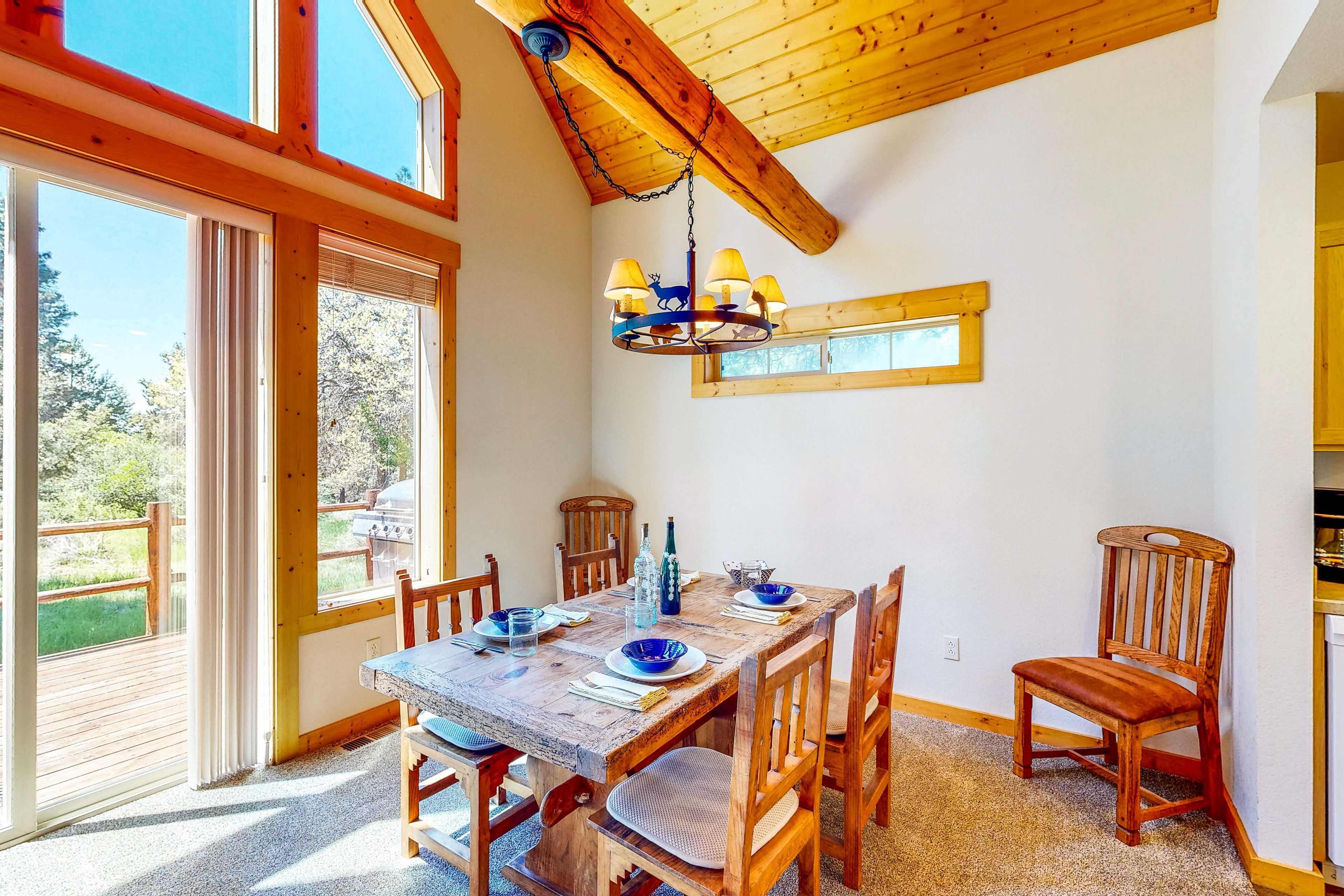 2BR Tree-Lined Cabin w/ Deck & Pool, Dog-Friendly