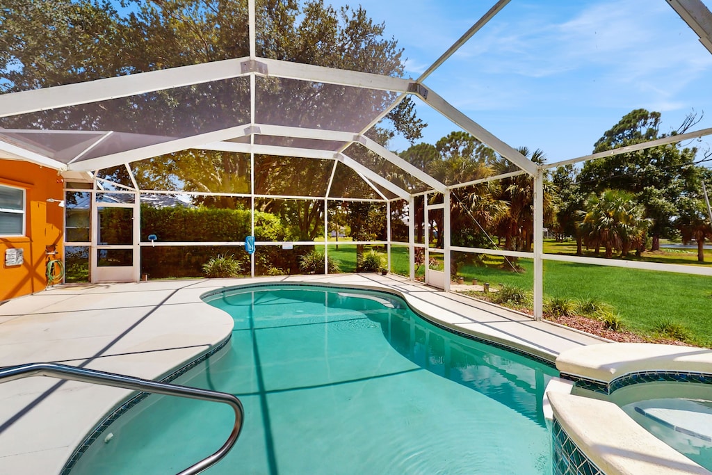 Large sparkling screened-in pool