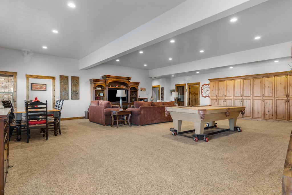 Averon Lodge - Bear Lake Luxury Rentals. Unwind in your spacious game room with pool table, cozy seating, and entertainment center - perfect for family fun and relaxation.