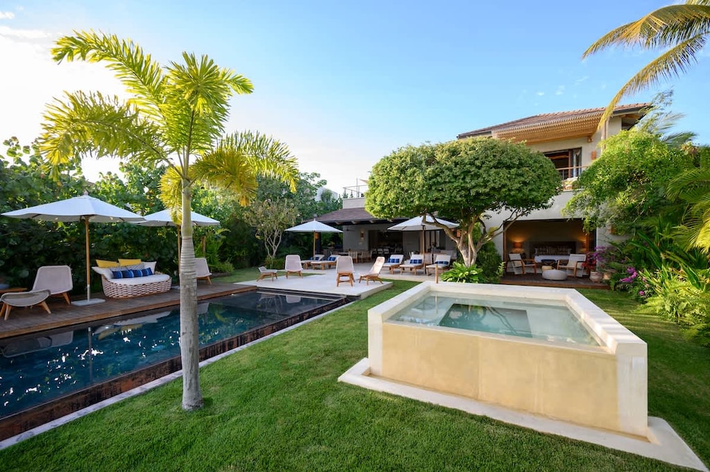 Resort-style outdoor living with multiple lounge areas