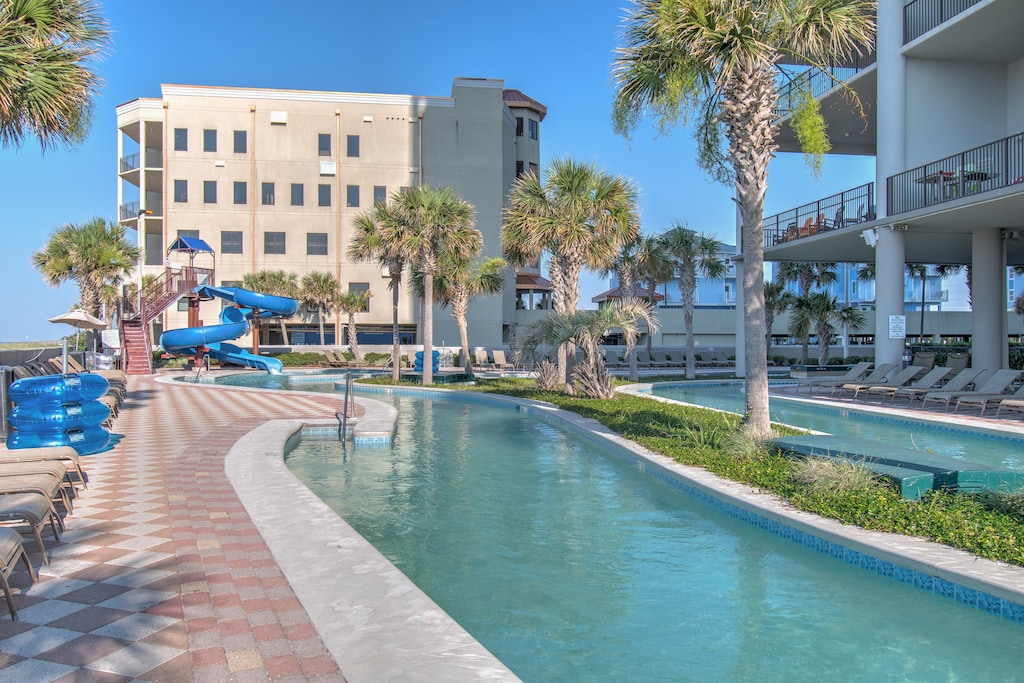 Fun for all ages, The Oasis features outdoor areas for everyone with a lazy river, waterslide, and adult only area