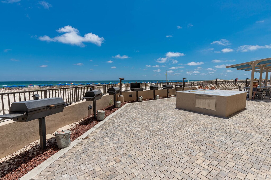 Grill up a feast with beachfront views and relax in the sun on the spacious patio at Phoenix X, perfect for family gatherings