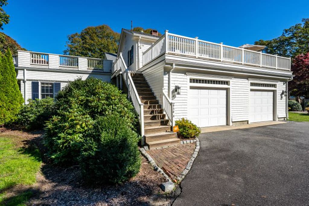 Entrance to the second floor suite and deck from back driveway.