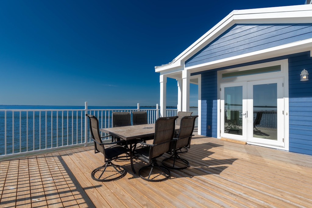 Expansive waterfront deck showcasing the iconic Sanibel Bridge!