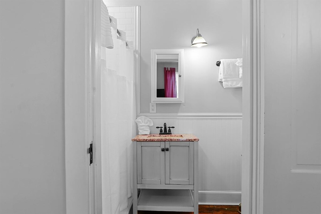 Modern touches meet classic style in this ensuite bathroom.