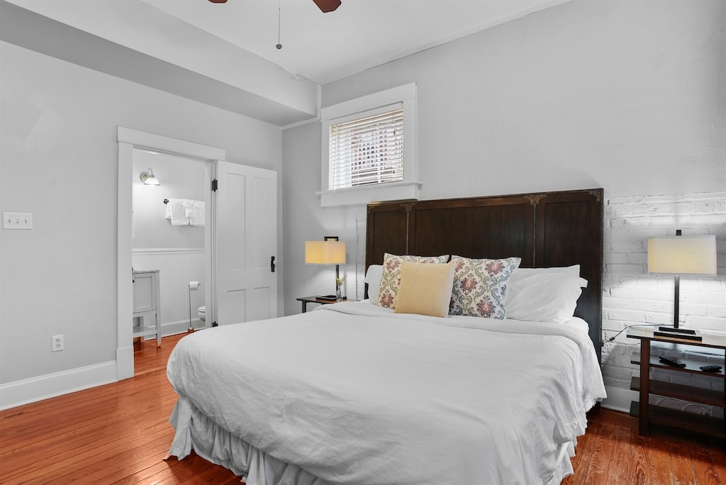 Spacious and serene king bed, the perfect place to rest and recharge.