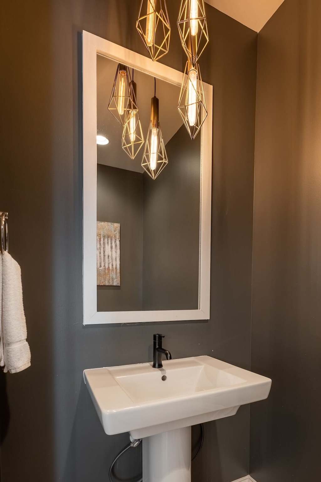  Chic geometric lighting and sleek design elevate your Nashville retreat experience!