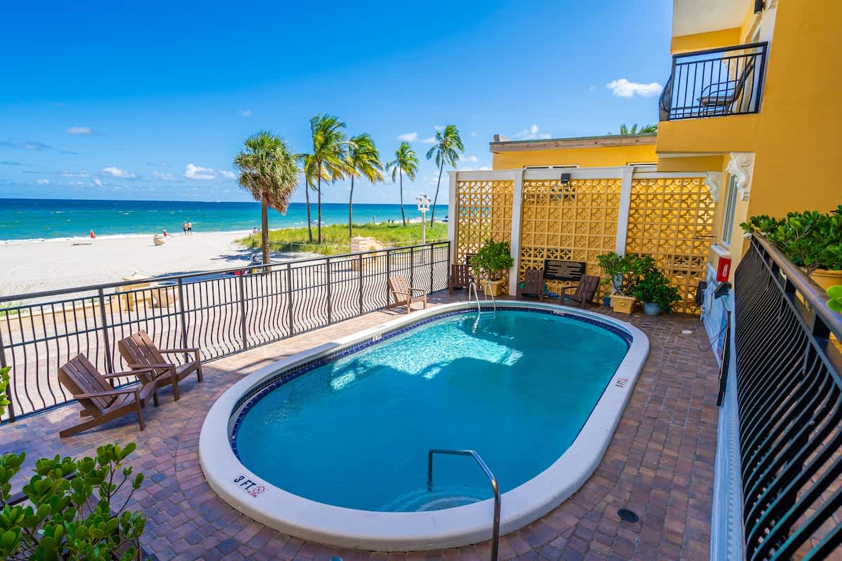 Swim, sunbathe, and stroll the beach—all just steps away! This beachfront rental features a private pool, ocean views, and tropical vibes for your perfect vacation escape.