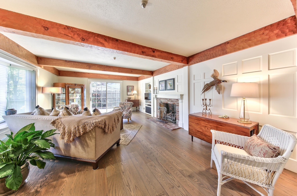 Living Room has a Gas Log Fireplace and Direct TV
