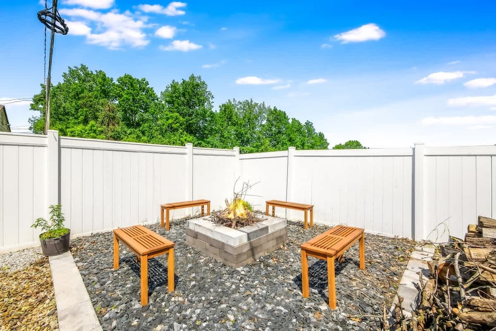 Gather ‘round the fire  A perfect backyard retreat with poolside vibes.