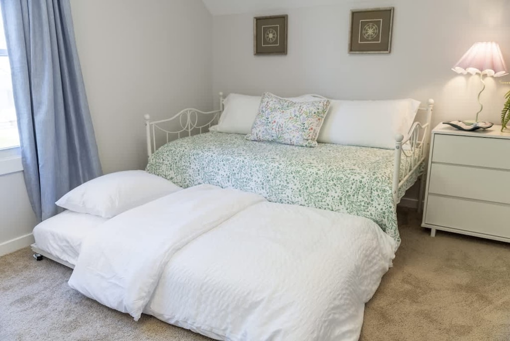 Serenity awaits in this quaint 2nd-floor bedroom with a twin setup, providing comfort and style in a compact space. Your ideal sanctuary after a long day. 