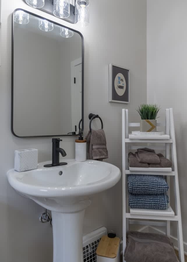 Crisp monochrome vibes in this sleek bathroom on the first floor.  #MinimalistDesign