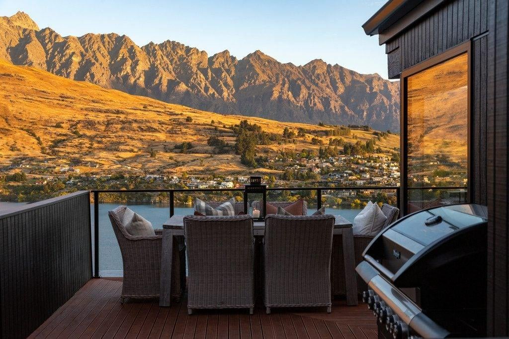 Enjoy unforgettable meals on the spacious deck with sweeping views of Lake Wakatipu and the Remarkables mountain range.