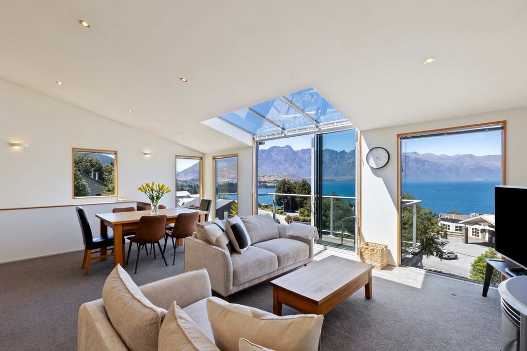 Bright open-plan living with floor-to-ceiling views.

Please note: Furniture is indicative only. 
