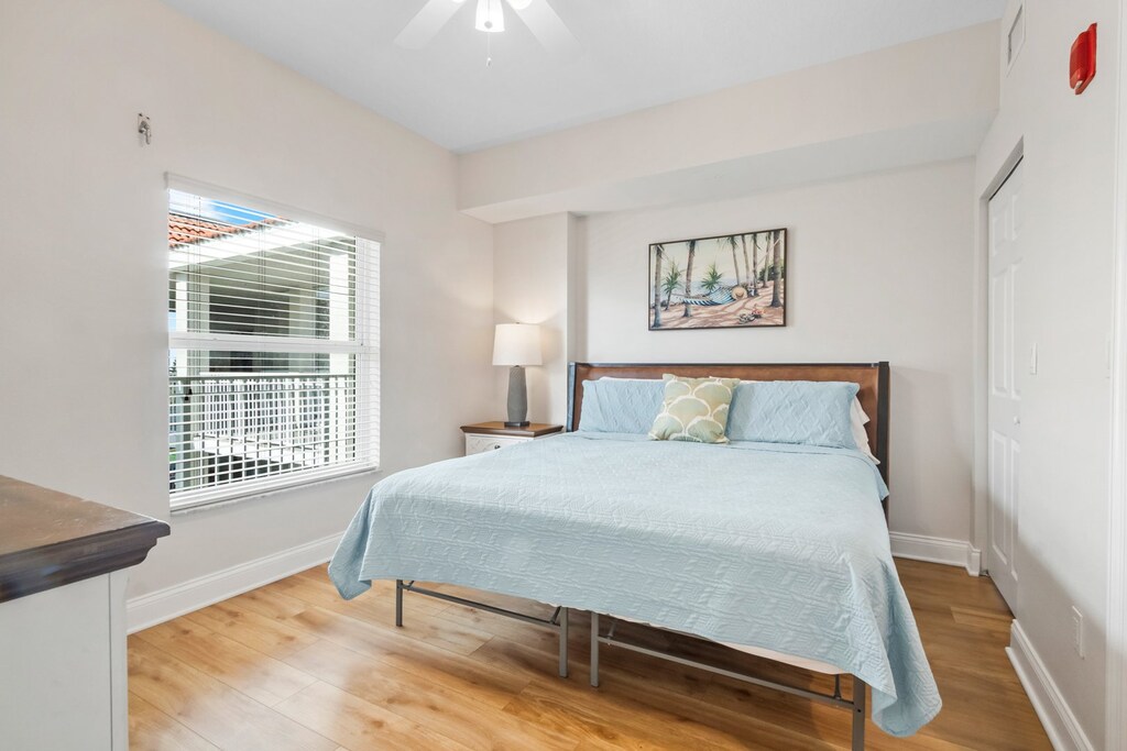 Guest bedroom 1  features a plush king bed
