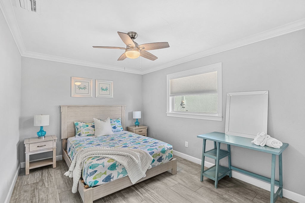 Guest bedroom 1 features a plush queen bed