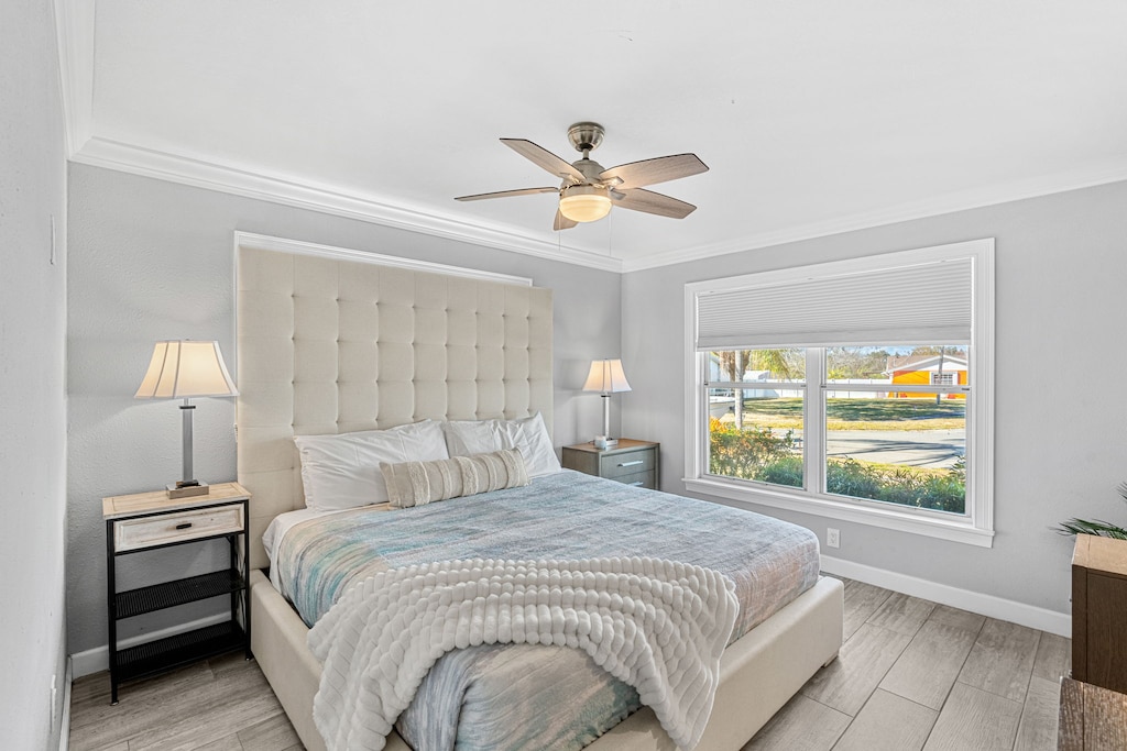 Master bedroom features a large king bed