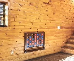 Game Room: Challenge your friends to a friendly match on our vibrant connect-four wall game!