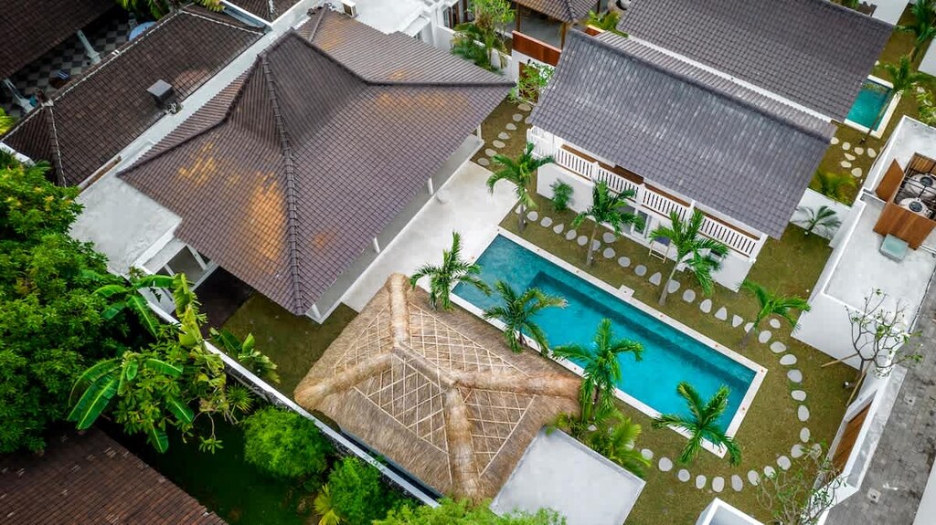 Escape to a tranquil 5-bedroom retreat with a sparkling pool.
