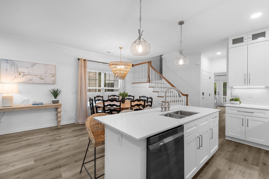 Your open-concept kitchen flows seamlessly into the dining area, perfect for gathering with loved ones over home-cooked meals.