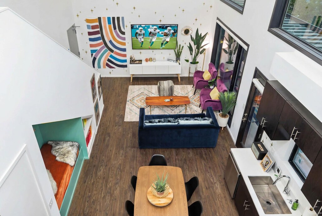 Step into the heart of Nashville in this stylish vacation home! Enjoy spacious living with vibrant decor, perfect for your group getaway. Relax and unwind in comfort. Book your Nashville Luxury Group Accommodations with Misfit Homes today!