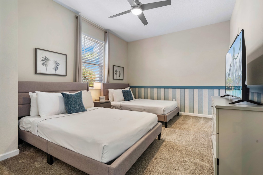 Bedroom 1 double full-size beds perfect for friends or family with plenty of space to relax