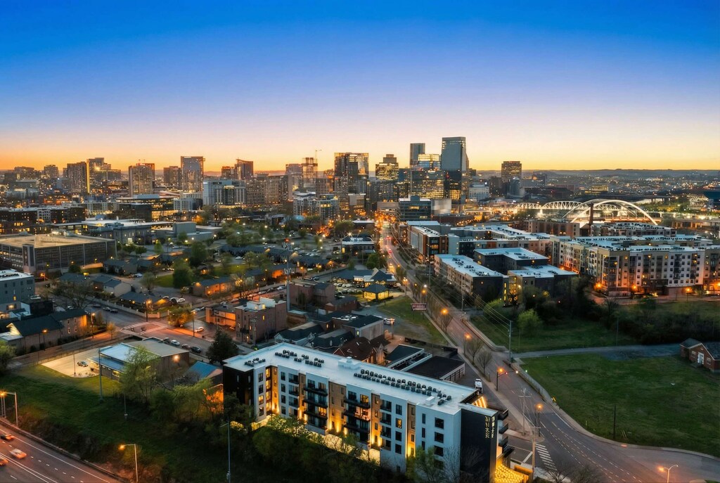 Nashville's downtown skyline painted gold at sunset, proof that location matters and you booked the view to prove it