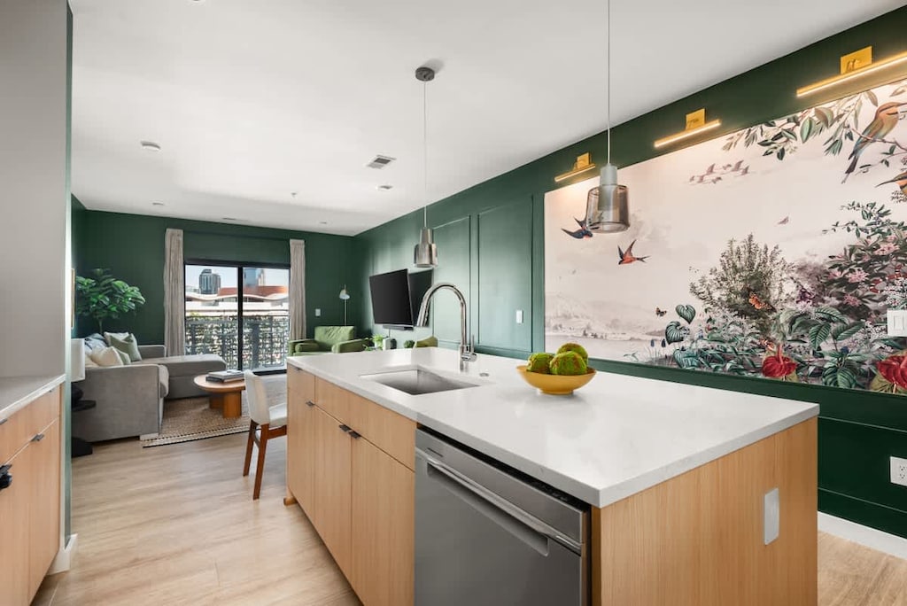 Open space kitchen with all the dishes, condiments, and amenities you could dream of (olive oil, avocado oil, balsamic vinegar. local coffee, tea, sugar, spices, etc)