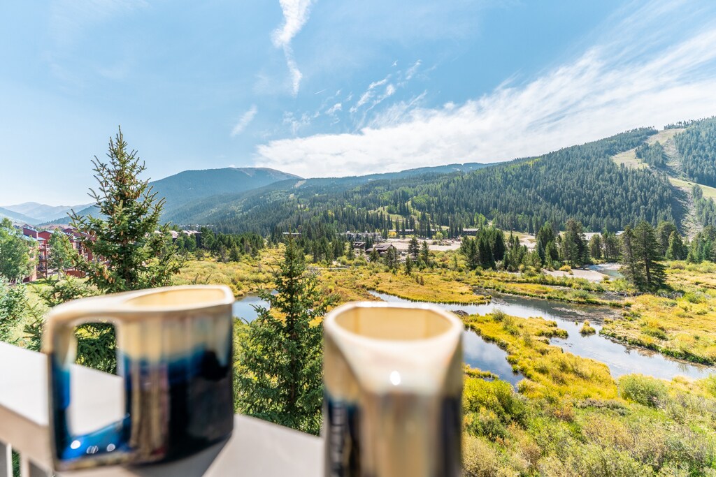 Sip your morning coffee while soaking in breathtaking mountain and valley views from your private terrace.