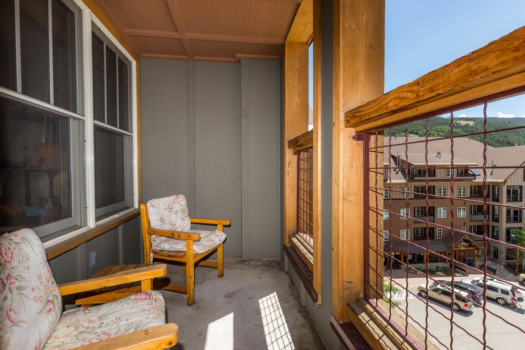 Relax on your private balcony with cozy seating and mountain views, perfect for morning coffee or evening wind-down.