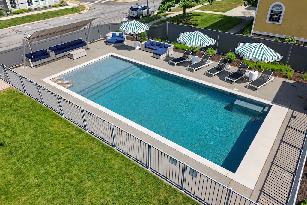 Relax beside the private heated pool while enjoying one of South Haven's premier luxury vacation homes. Perfect for family vacations, reunions, and summer getaways.