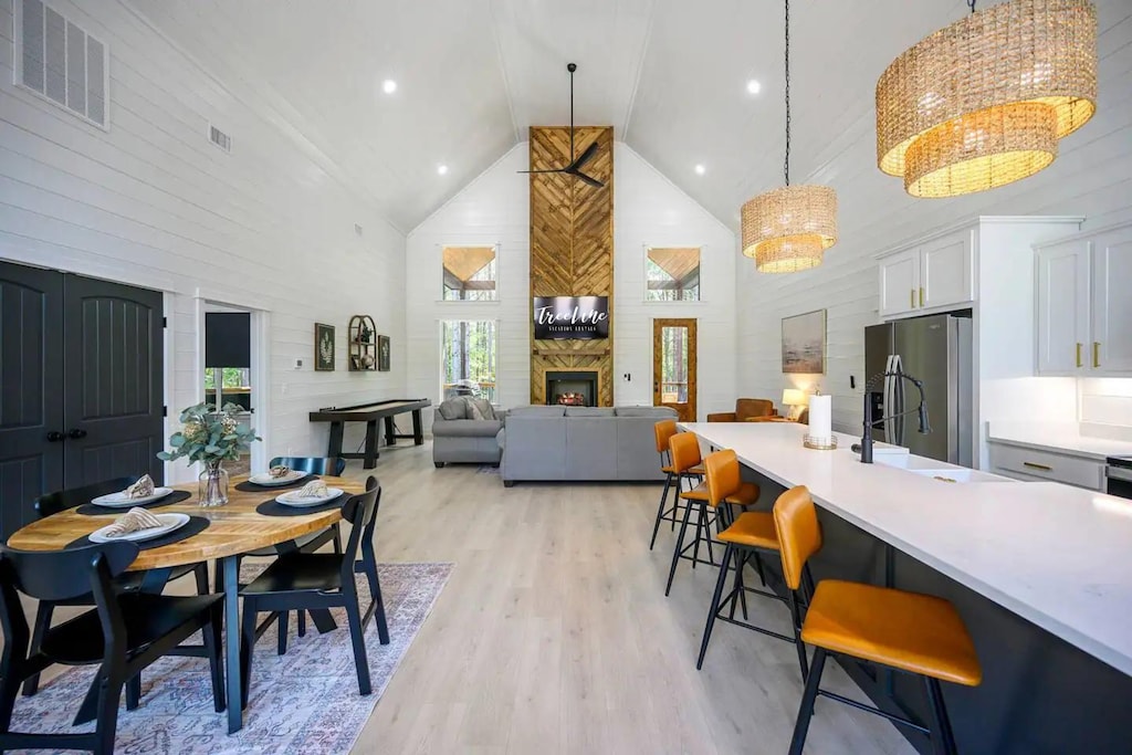 Flow effortlessly from cooking to dining to unwinding in this open-plan setup.
