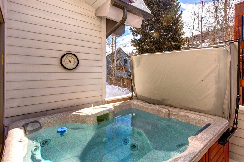 A private open-air hot tub awaits on 1 of 2 balconies.