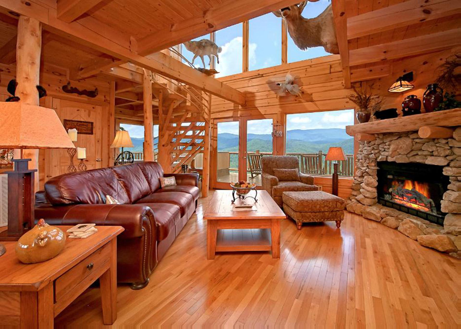  Open floor-plan living room with wood fireplace.