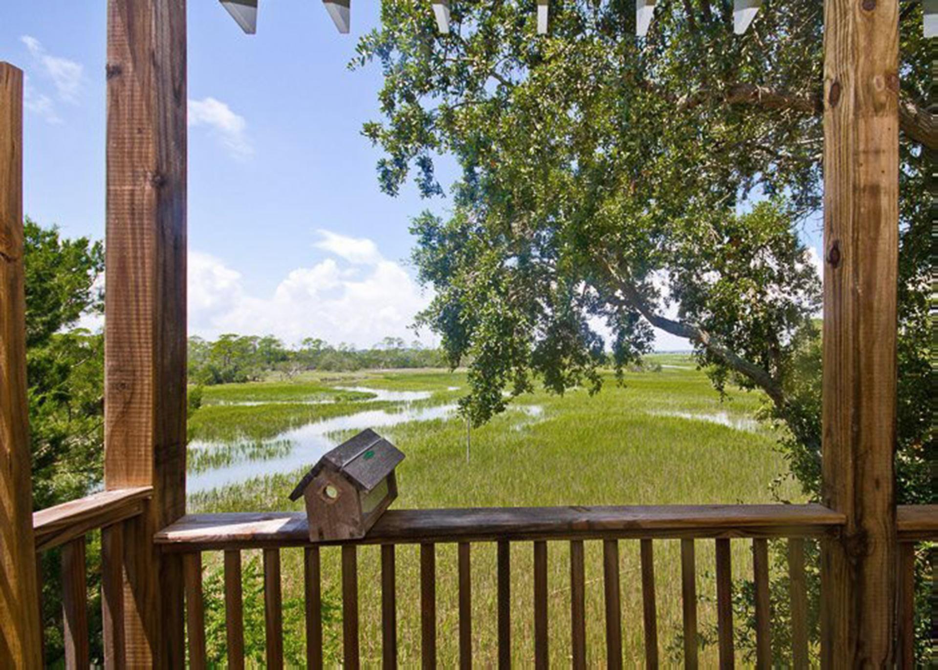  Enjoy watching the birds just over the marsh from the comfort of your private deck.