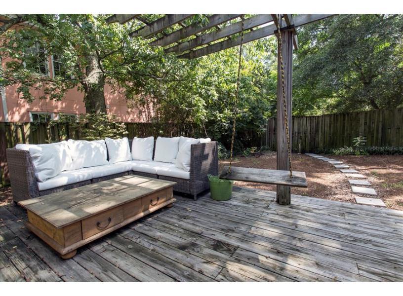 Spacious and Shady back deck and yard.