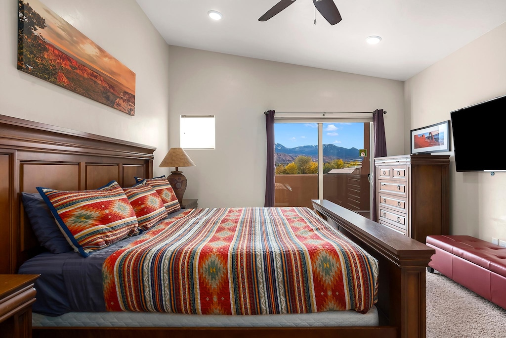 Master bedroom with king bed and attached bath