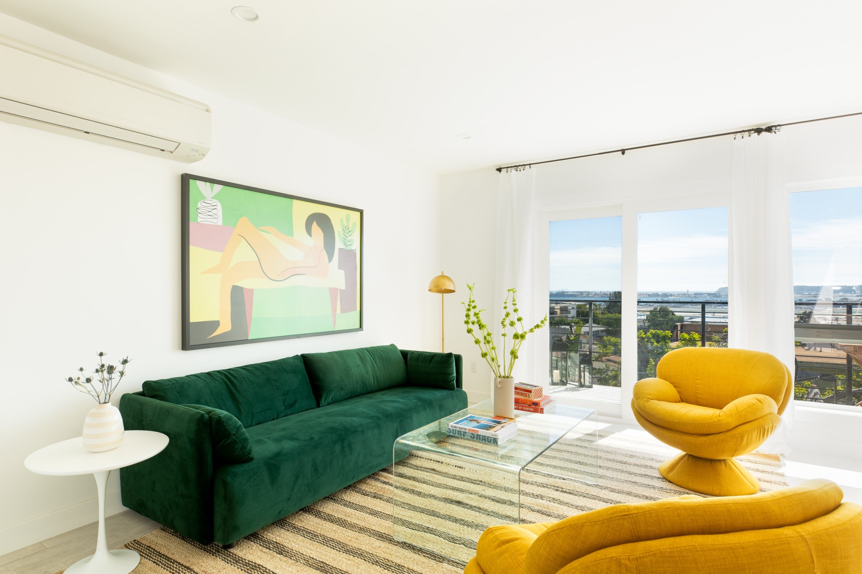 Unit 2 (upstairs) - Living room has direct access to outdoor balcony.