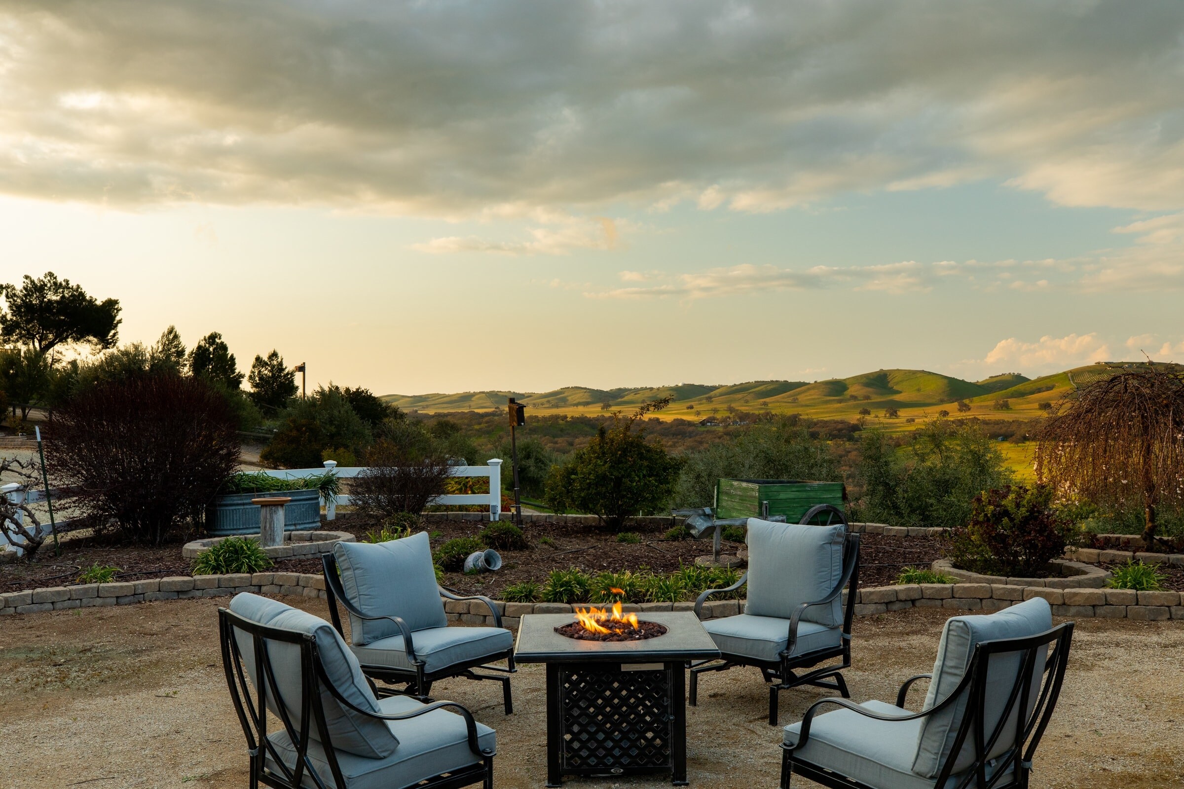 Stay cozy by the firepit with a view.