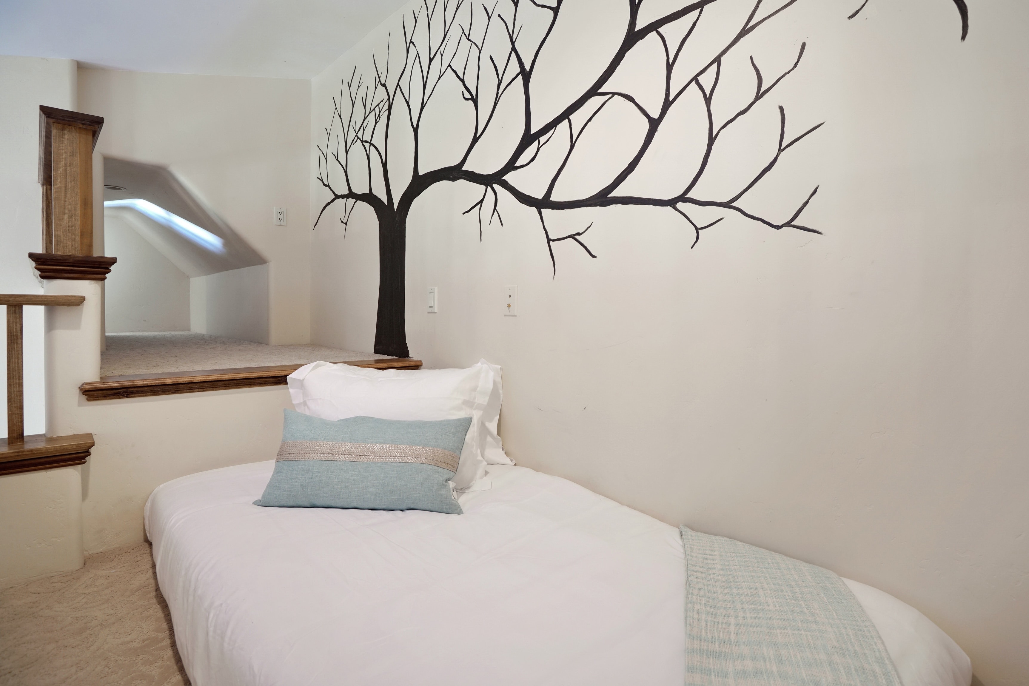 Cozy guest bedroom loft.