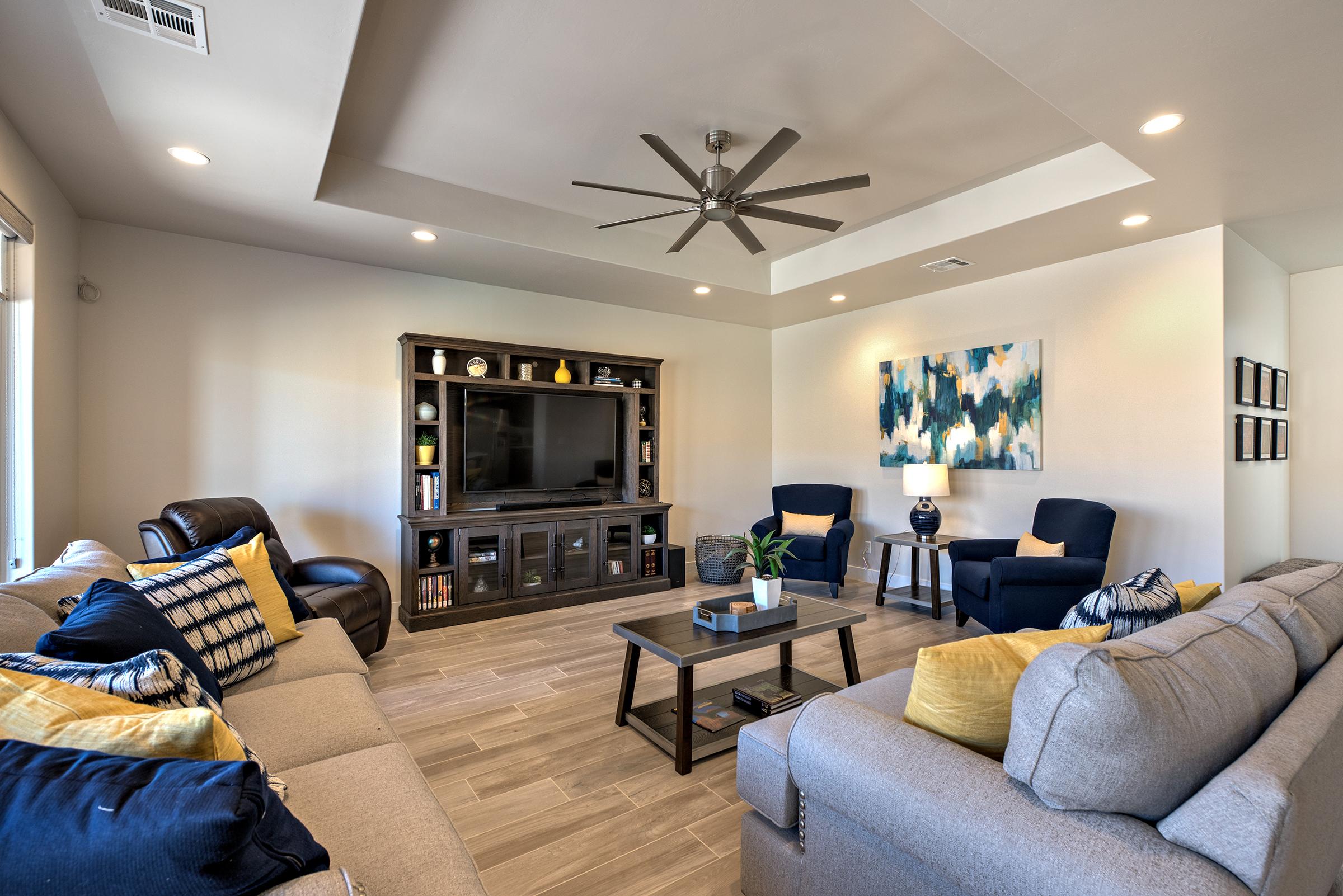 The Living Room is located adjacent to the dining room and is the perfect place to relax and watch your favorite movie or TV program.