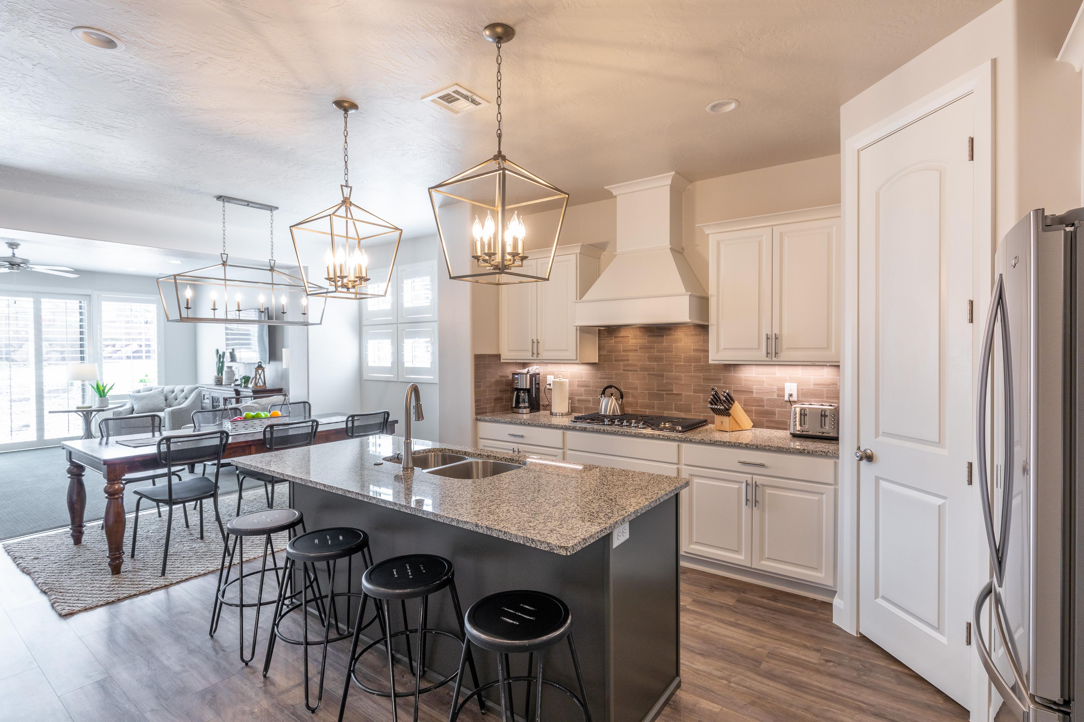 The Kitchen Island comfortably seats 4 adults and creates a great space for serving and preparing meals. 