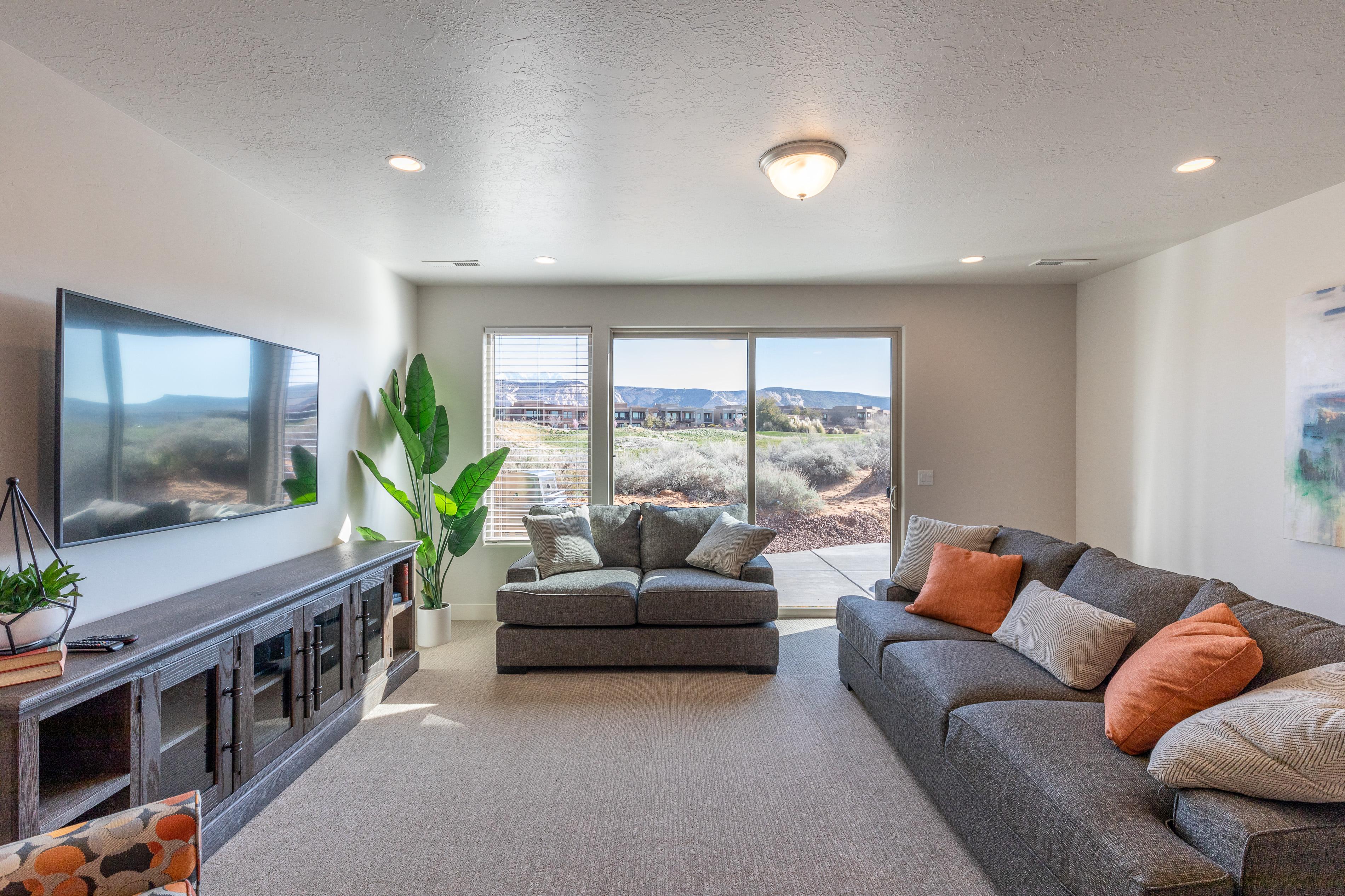 The living room has a beautiful view of The Ledges Golf Course.