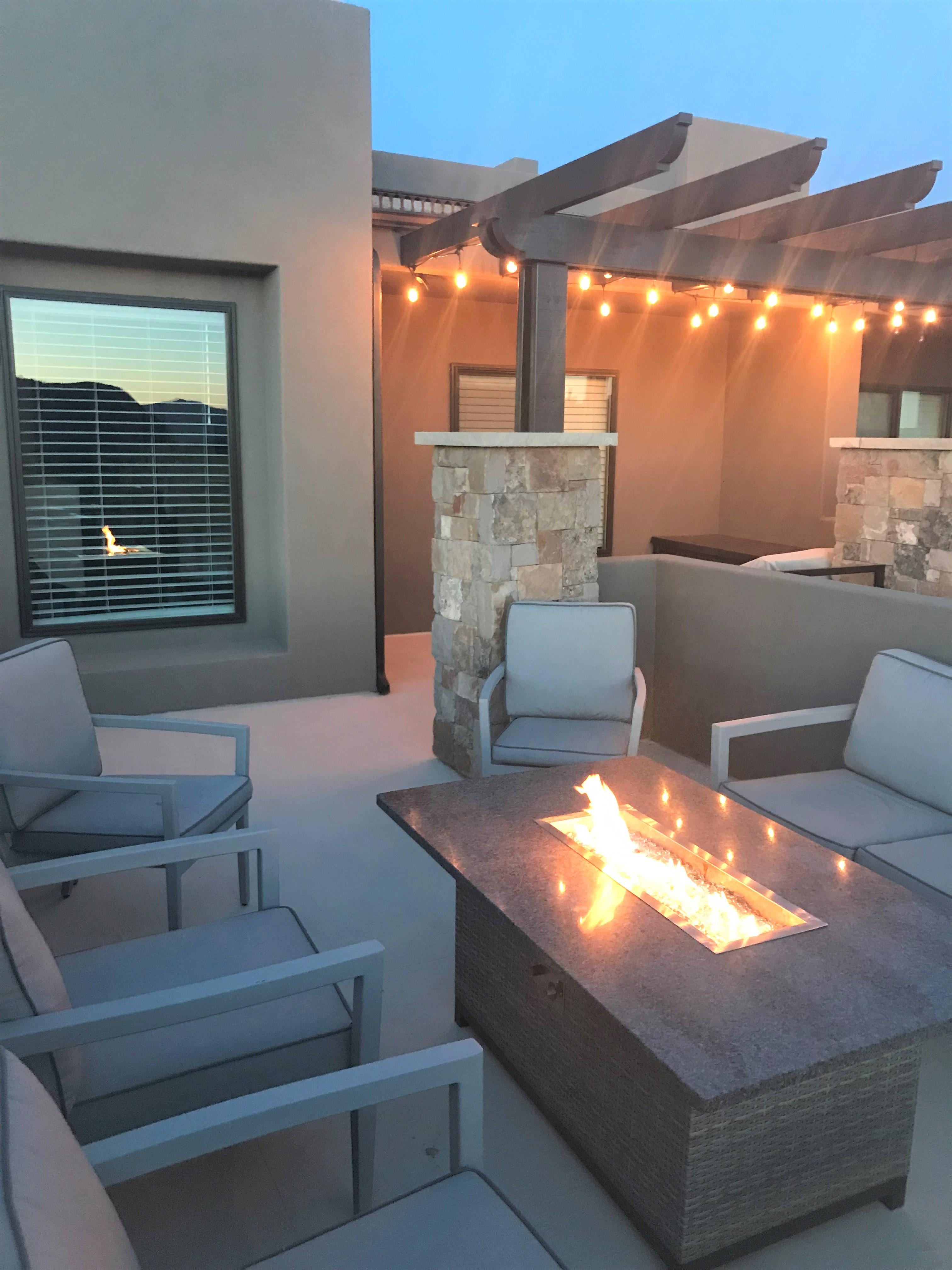 Enjoy a stunning sunset or sunrise from the front patio while sitting around our cozy outdoor firepit.
