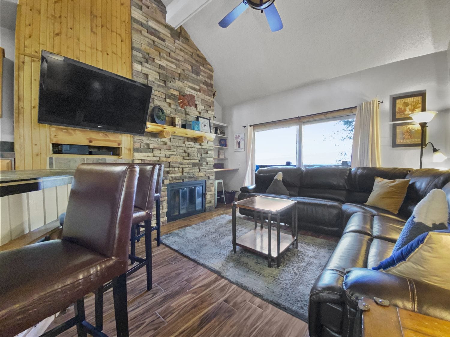 Cozy up in the living area with a flat screen TV and fireplace! - 