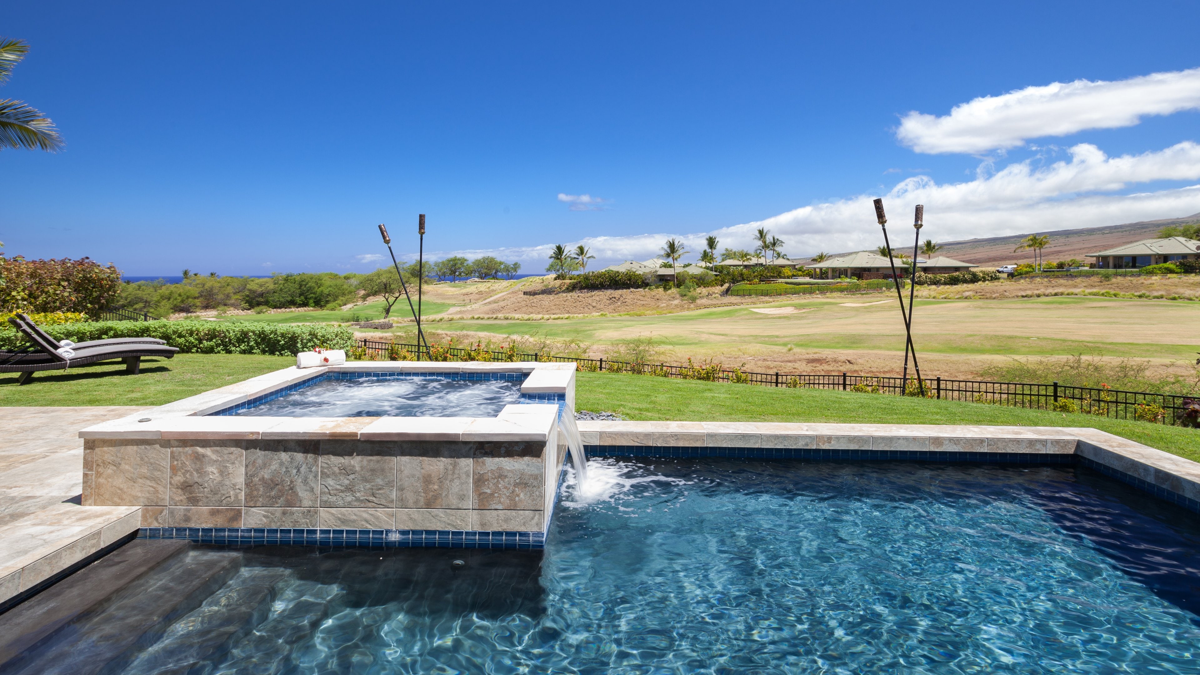 Private pool and Tiki Torches with views of Golf and Ocean