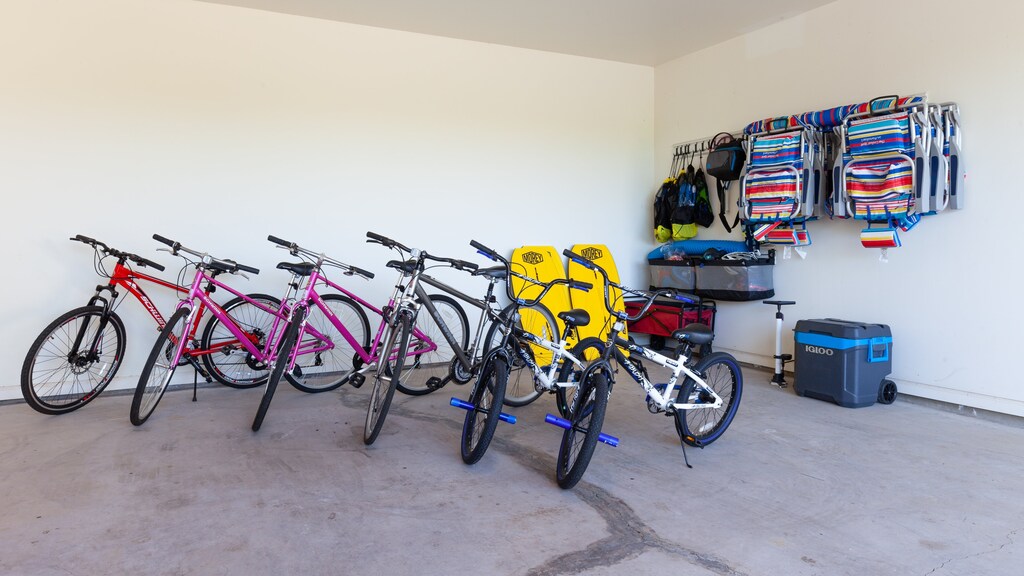 Large double garage full of adult and kids bikes and beach gear
