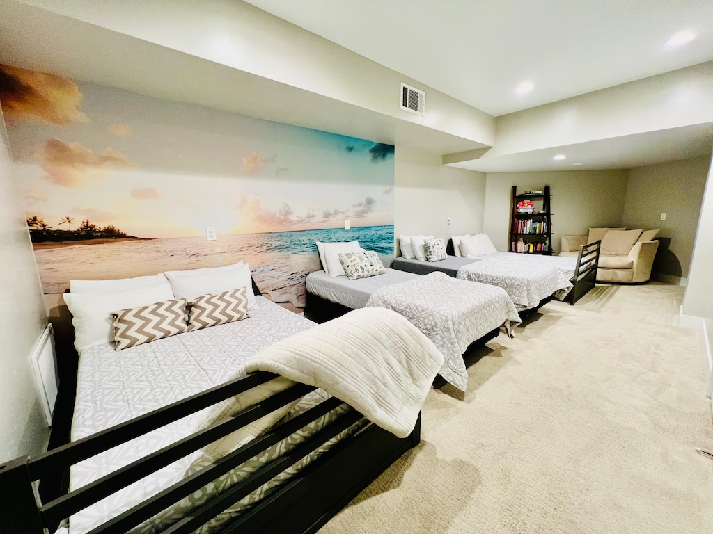 The bonus room is located off the garage entrance. There are 2 full beds, 2 twin beds. The bonus room has a SmartTV with an HDMI cable accessible for easy hookup to a guest's personal xBox. Bonus room sleeps 6.