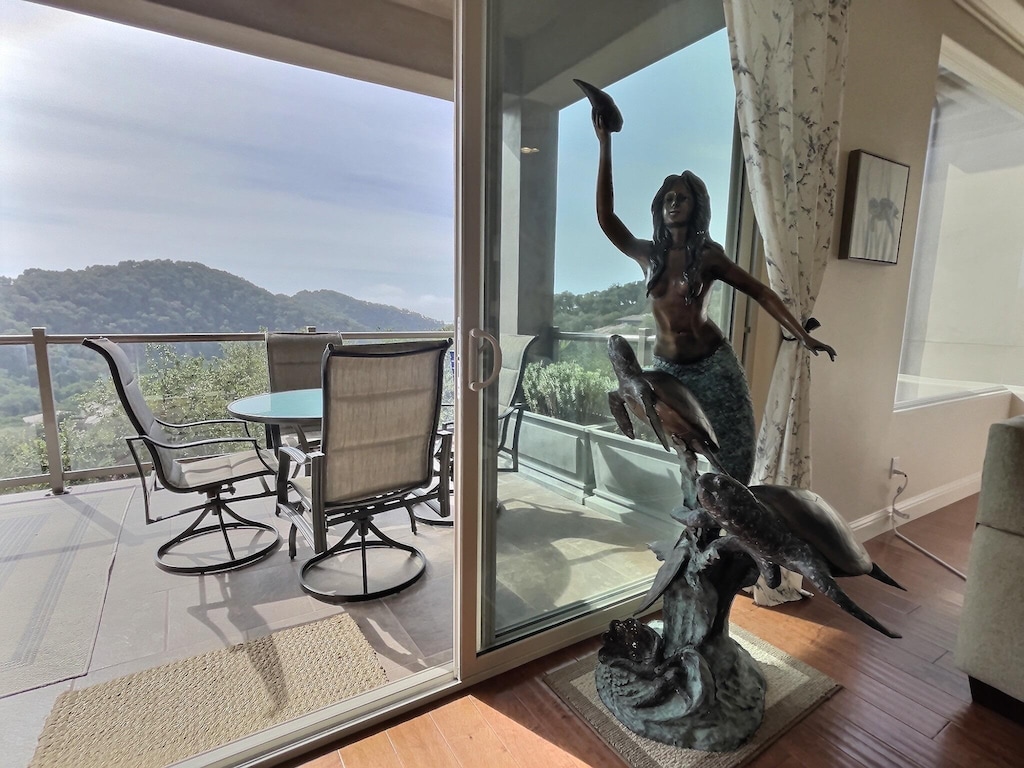 Aloha, our treasured mermaid welcomes guests to Aloha Avila. Ocean views and the historic Seven Sisters mountains surround you. 